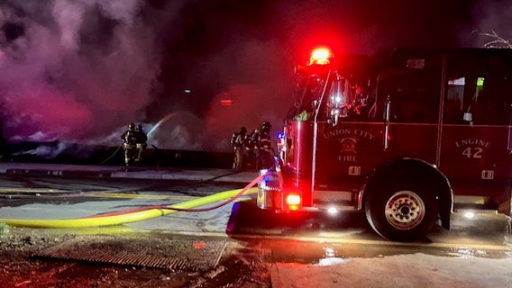 Massive fire destroys abandoned Fairburn church, damages home
