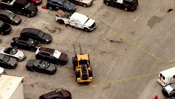Woman killed by forklift carrying car at business in Lake City
