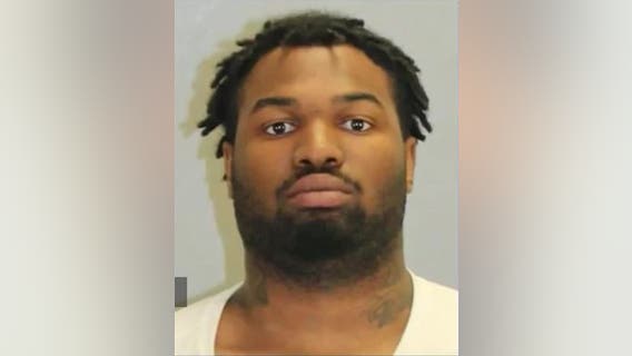 Man charged with stealing postal worker's keys at gunpoint