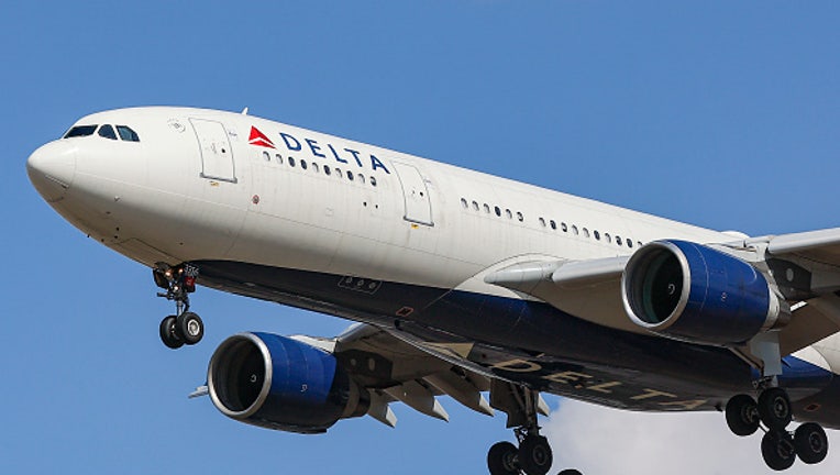 Delta Air Lines Airbus A330 aircraft as seen flying over Myrtle avenue during a summer day for landing at London Heathrow Airport LHR, a famous spot for planespotters, The arriving wide-body passenger airplane has the registration N856NW and is powered by 2x PW jet engines. Delta Airlines is a major legacy carrier from the United States of America, member of SkyTeam aviation alliance group and has headquarters in Atlanta, Georgia. London, United Kingdom on August 2022 (Photo by Nicolas Economou/NurPhoto via Getty Images)