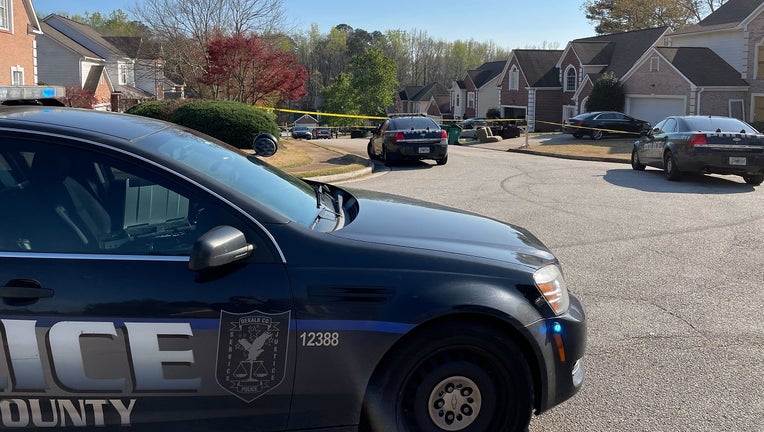 Police investigate a shooting along Sunflower Place in DeKalb County on March 21, 2023.
