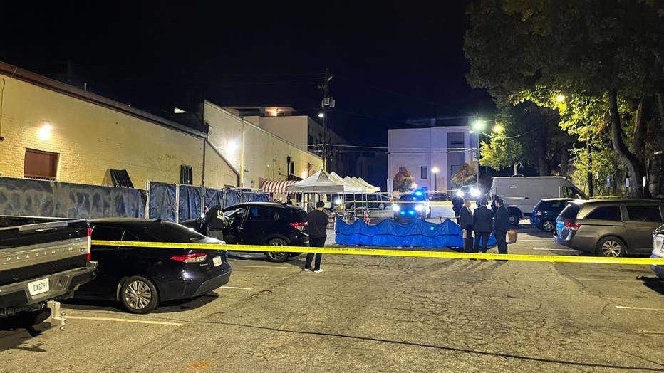 Atlanta Police canvass the parking lot of Manuel's Tavern after a deadly shooting on Oct. 27, 2022.