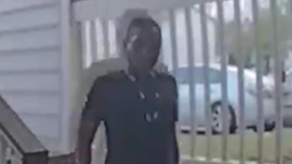 A doorbell camera catches a woman snatching a family dog from an Avondale Estates apartment complex on March 26, 2023.