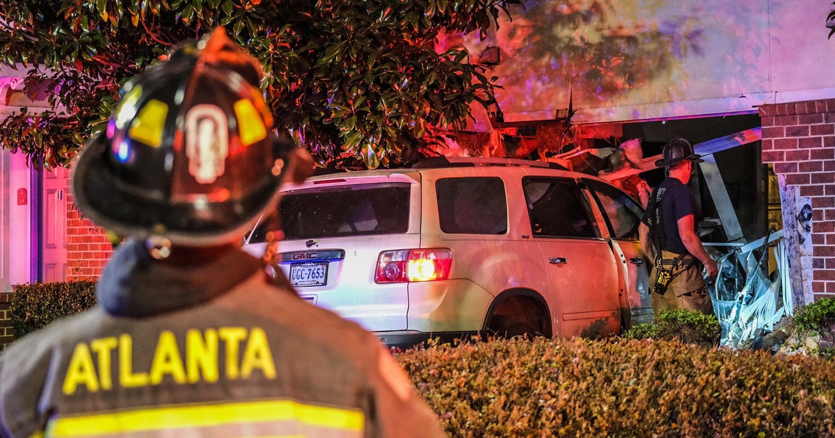Driver, sleeping woman hospitalized after SUV crashes into Atlanta ...