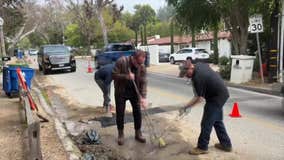 Fed up by Los Angeles pothole, Arnold Schwarzenegger fills it himself