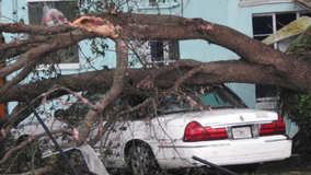 Suspected tornado flips cars, leaves damage trail in South Florida as storms race across state