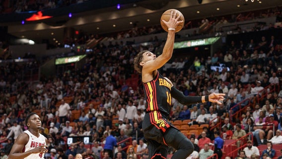 Hawks grab No. 7 seed in East, hold off Heat 116-105