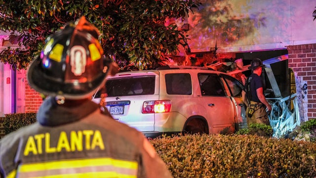 Driver, sleeping woman hospitalized after SUV crashes into Atlanta apartment building