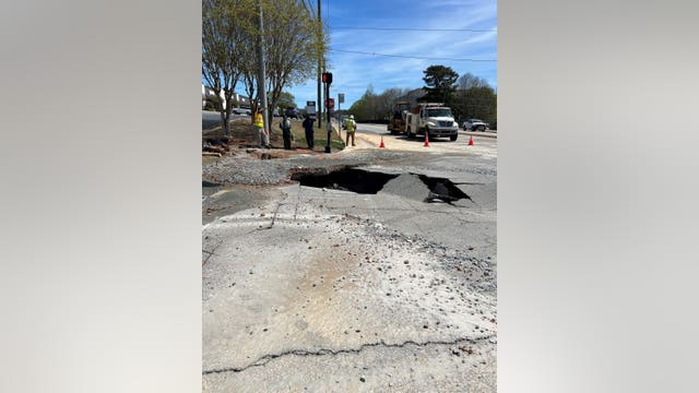 Truck hits fire hydrant on Chamblee Tucker Road, street shuts down