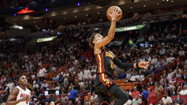 Hawks grab No. 7 seed in East, hold off Heat 116-105