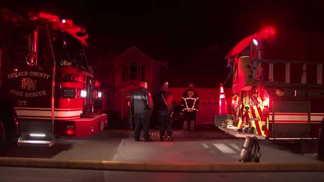 Firefighters pull trapped resident out of burning DeKalb County home