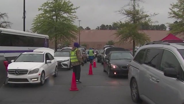 New Birth Missionary Baptist Church gives away 1K boxes of food, tablets