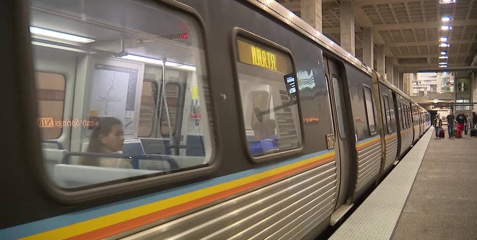 A thin, rectangular screen sits above the train window on the exterior of the train. The word “MARTA” is lit up on the screen.