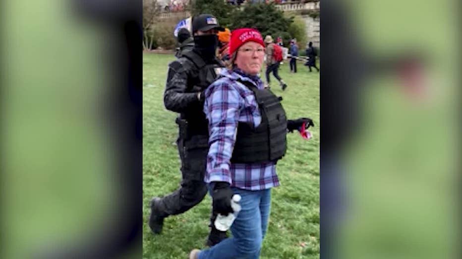 Federal prosecutors say Lisa Eisenhart and Eric Munchel can be seen in multiple photos taken during the Capitol riot on Jan. 6, 2021.