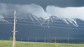 Watch: Rare funnel cloud hovers over Montana mountains