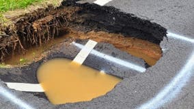 Giant sinkhole shuts down road in Cherokee County