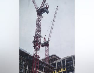 A crane collapsed damaging a building under construction and injuring four workers in Midtown Atlanta on May 22, 2023.