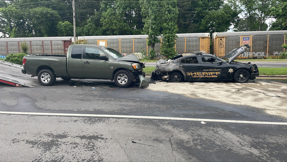 Clayton County deputy car fire closes all lanes near Forest Parkway, Bartlett Drive