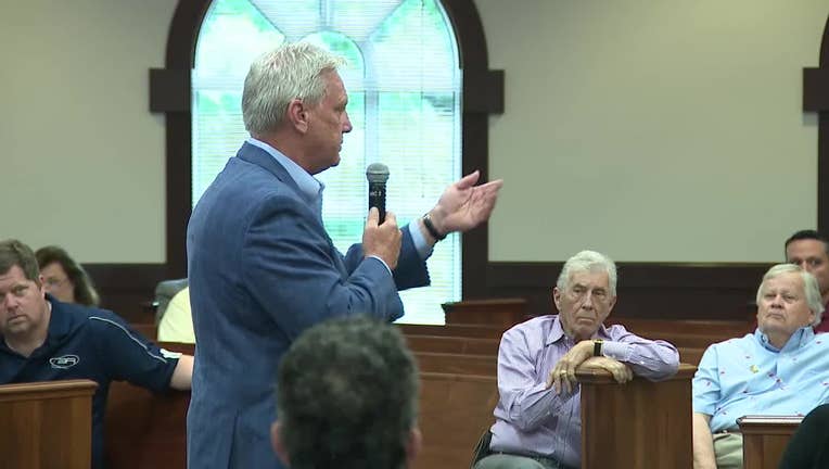 The mayor of Roswell met with business owners along Canton Street to discuss concerns about a plan to block off traffic to vehicles during a meeting on May 9, 2023.