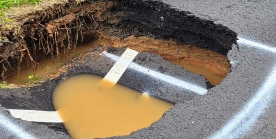 Giant sinkhole shuts down road in Cherokee County | FOX 5 Atlanta