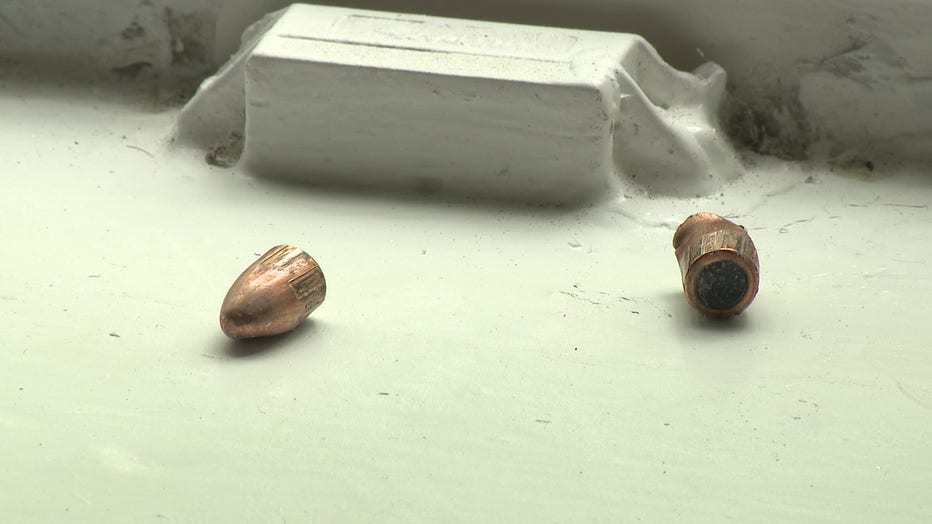 Deon Green shows bullets which pierce his children’s bedroom as they slept on May 27. 2023.