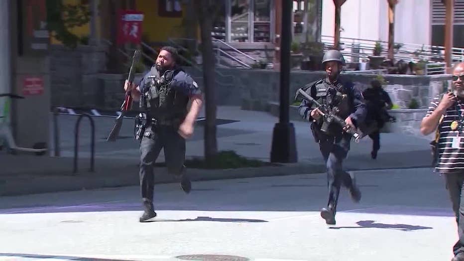Law enforcement officers from multiple agencies in Atlanta respond to a report of an active shooter in Midtown on May 3, 2023.