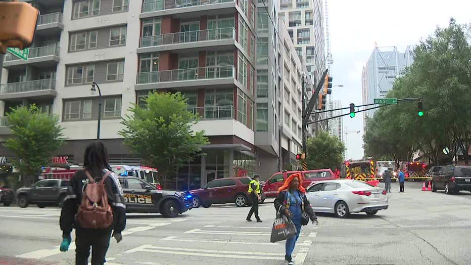 A crane collapsed damaging a building under construction and injuring four workers in Midtown Atlanta on May 22, 2023.