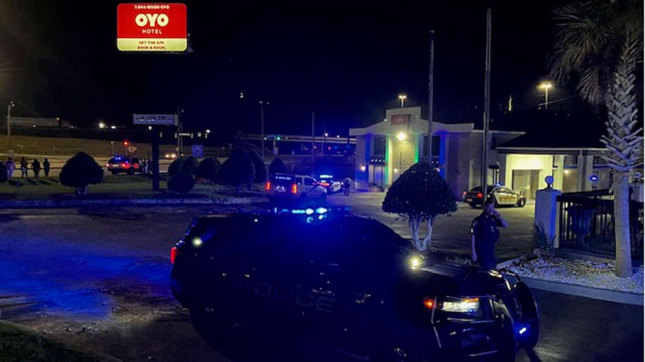 Investigators surround a Covington motel after a man was shot and killed by police during a disturbance call on May 23, 2023.