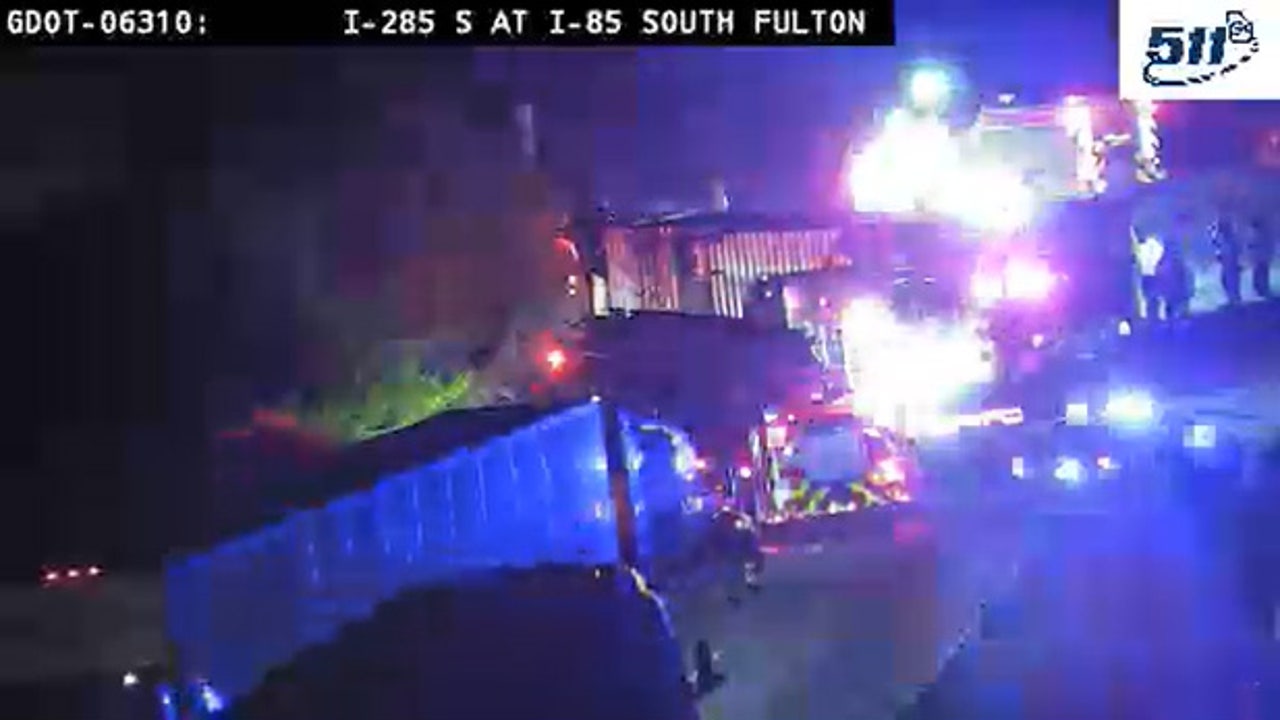 Overturned truck carrying trash blocks I285 near Atlanta airport Overturned truck carrying trash blocks I285 near Atlanta airport