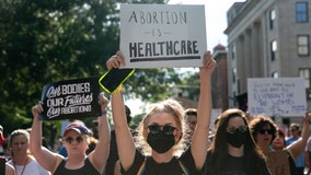 North Carolina governor signs bill revising state's abortion law before it takes effect
