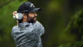 Golfer Adam Hadwin tackled by security after trying to celebrate fellow Canadian Nick Taylor's win