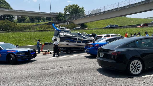 3 people injured in multi-vehicle crash, including boat, on Downtown Connector