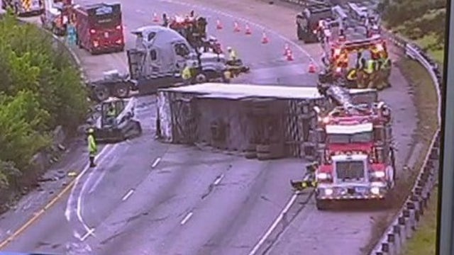 Overturned truck carrying butter blocks I-285 near Atlanta airport