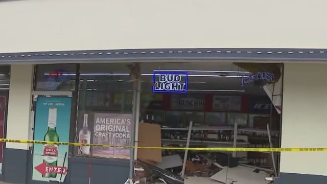 Crash forces car to careen into package store in Cobb County