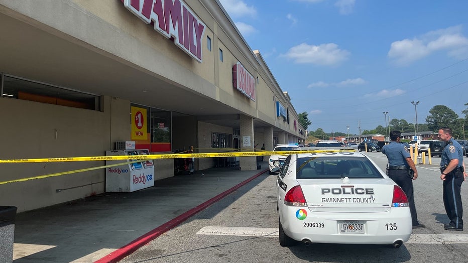 Gwinnett County Police investigate a stabbing at a store off Jimmy Carter Blvd. near Singleton Road near June 5, 2023.
