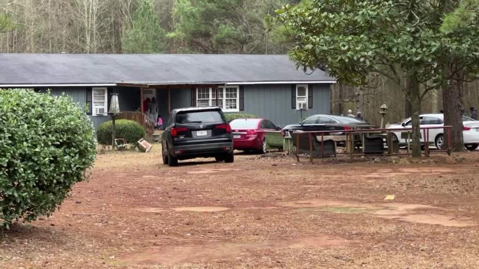 Coweta County Sheriff's deputies investigate the murder of two men in a home along Deep South Road on Jan. 17, 2023.