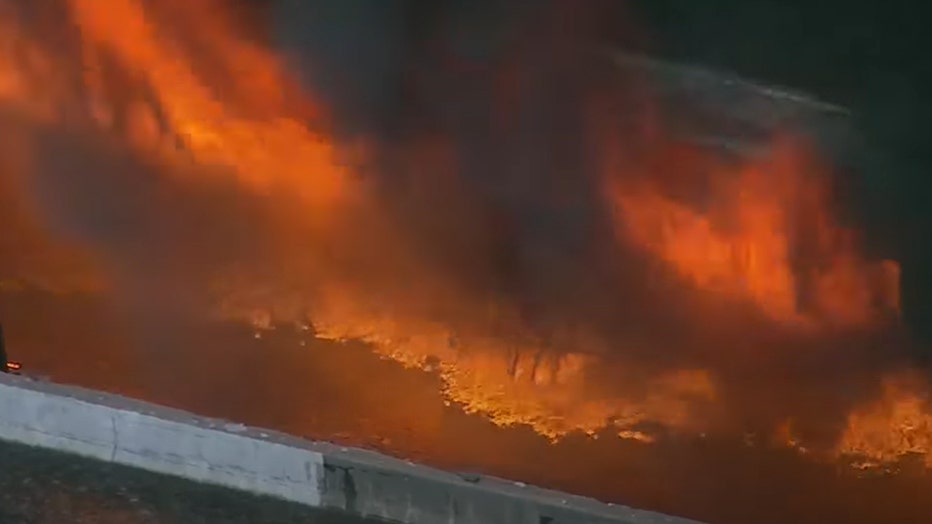 Plastic and fiberglass spools stored under I-85 in Atlanta catch fire leading to the collapse of some spans on March 30, 2017.