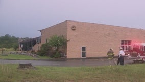Strong winds knock down brick wall at Calhoun gym