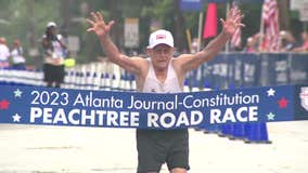 Video: 92-year-old Peachtree Road Race legend crosses finish line for last time