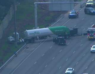 A crash involving a tanker shuts down most of eastbound I-285 near Mt. Vernon Highway on July 25, 2023.