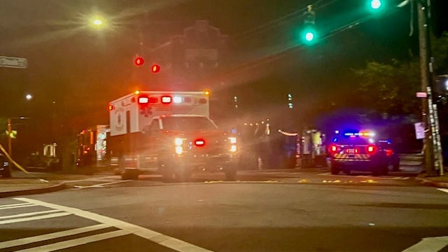 Man throwing bottles shot in Atlanta parking lot, police say