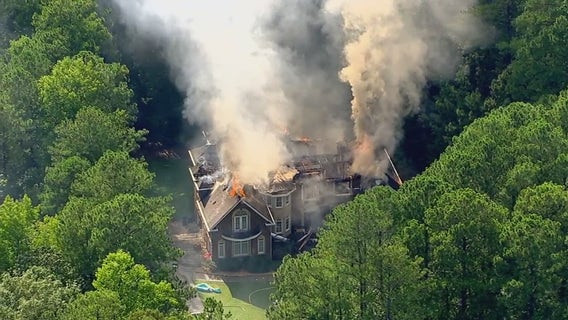 Crews battling house fire in South Fulton