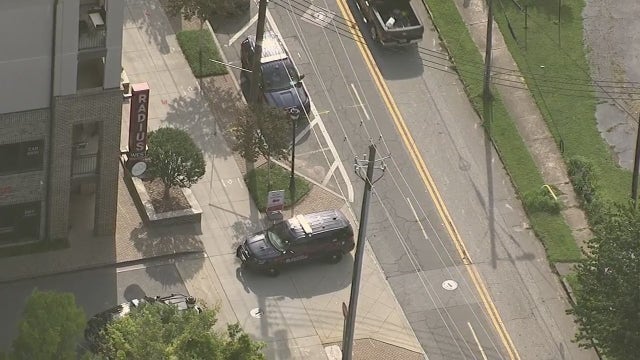 SWAT storms West Midtown apartment to free woman being held hostage by boyfriend