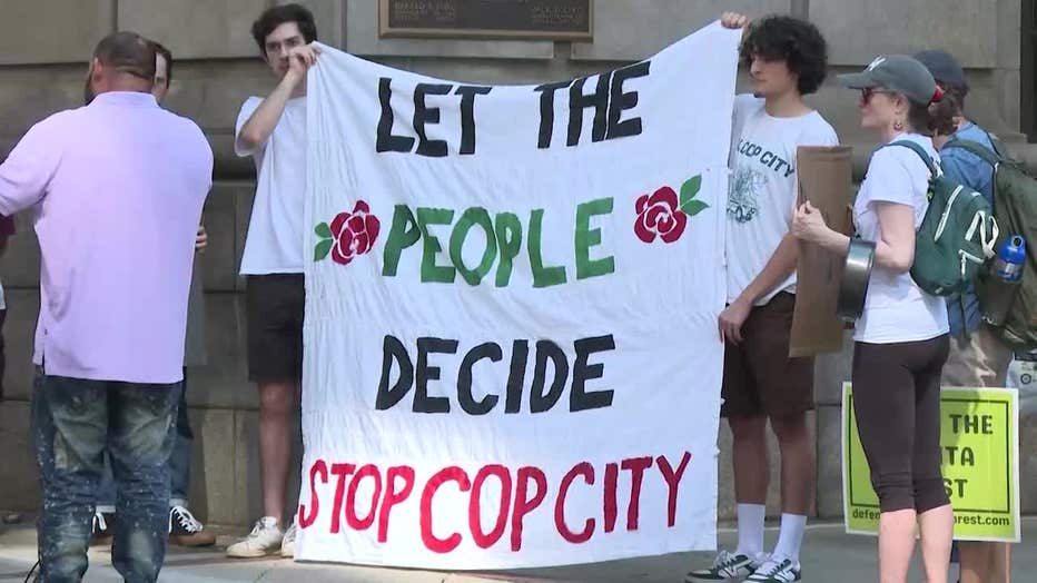 Protesters opposing the Atlanta Public Safety Training Center surround the Fulton County Government Center in downtown Atlanta on Aug. 14, 2023.