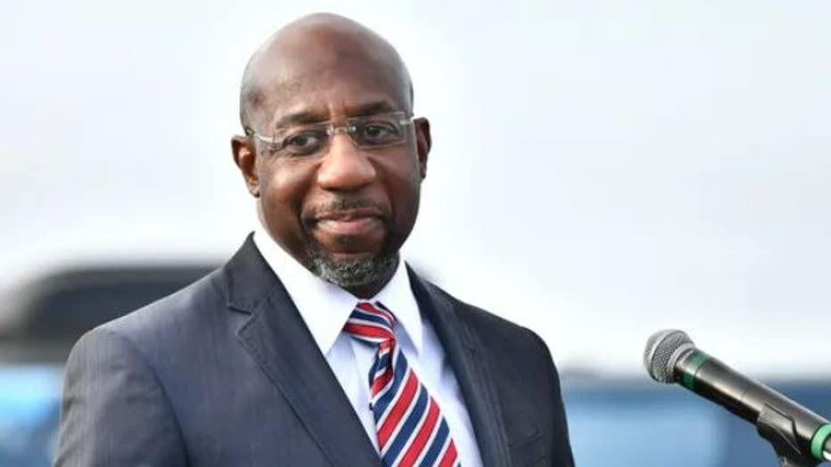 Raphael Warnock speaks during the "Vote GA Blue" concert on Dec. 28, 2020, in Stonecrest, Georgia. (Paras Griffin/Getty Images)