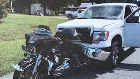 Police chief astonished after alleged drunk driver drives miles with motorcycle lodged in truck