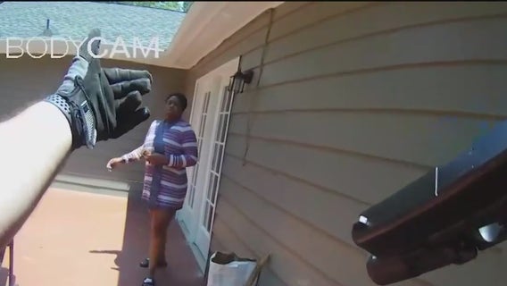 Woman claims police held her to get husband to surrender