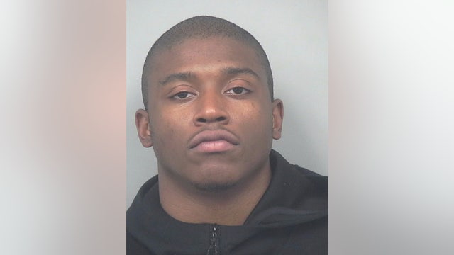 Suspect in murder at Gwinnett County HomeTowne Studios surrenders to police