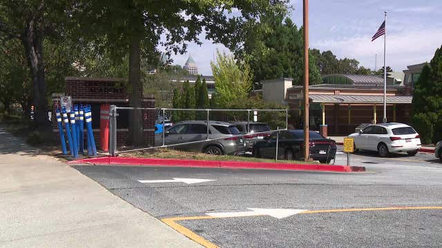 Downtown Atlanta school under lockdown as police search for wanted man