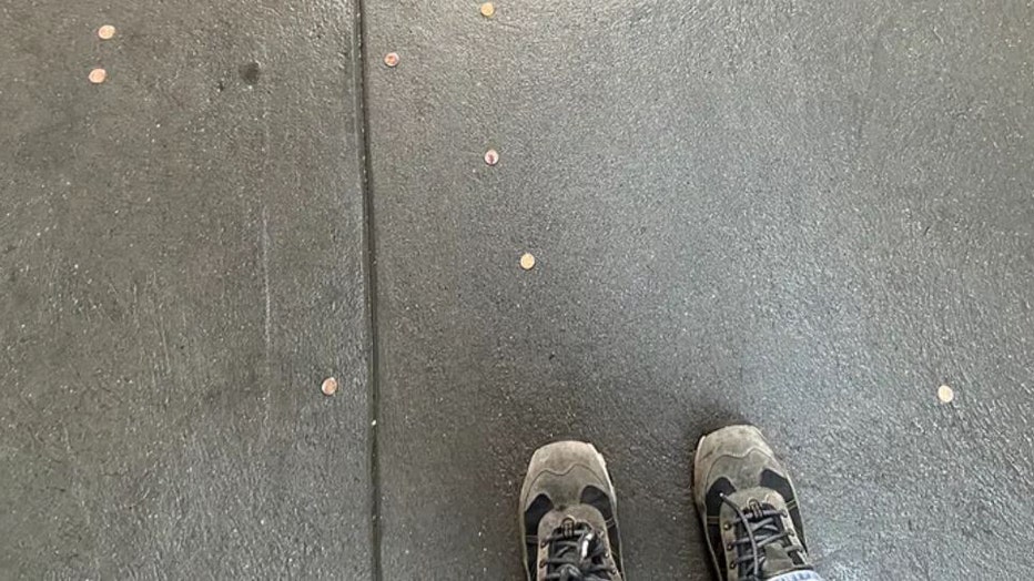 Reporter-finds-pennies-on-the-ground.jpg